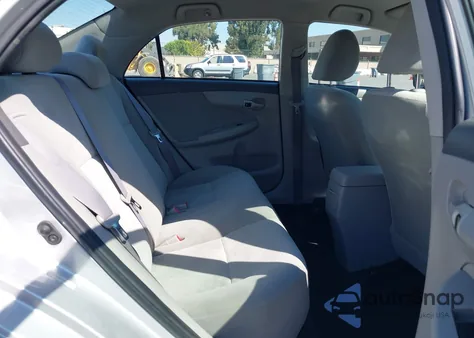 2009 Toyota Corolla Le from USA, damaged, VIN 1NXBU40E69Z162409